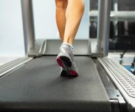 Image of female foot running on treadmill